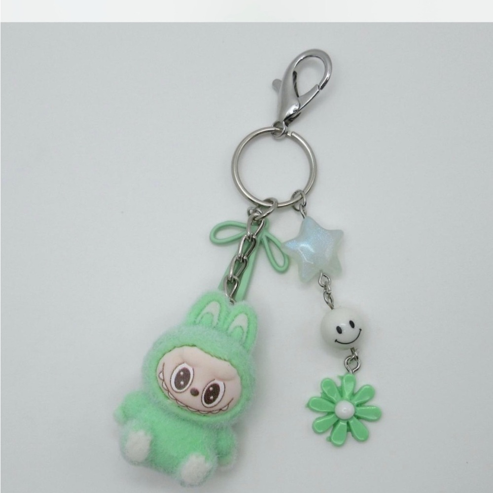 Green and White labubu bag charm with flower